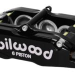 Pinza de freno Wilwood 120-13383 Billet Narrow Superlite con montaje de orejetas, izquierda, 6 pistones, color negro.