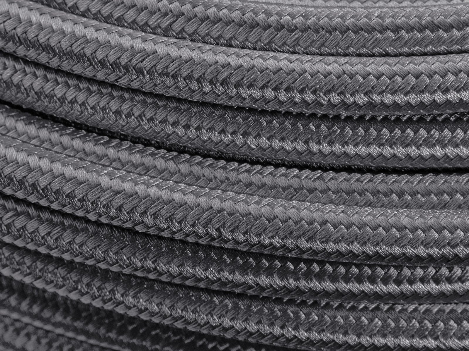 an8-10mm-3-8-przewod-ptfe-teflonowy-w-stalowym-oplocie-czarny_3 Manguera de combustible AN8 de 10 mm (3/8") con revestimiento de nailon trenzado de PTFE y teflón, color negro. - Imagen 1