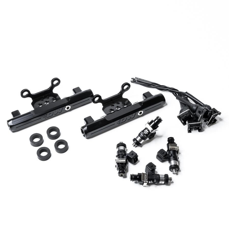 deatschwerks-listwa-paliwowa-2200cc-z-konwersja-do-gornego-zasilania-z-bocznego-subaru-04-06-sti-legacy-gt Riel de combustible con inyectores DeatschWerks de 2200 cc para Subaru STI y Legacy GT 2004-2006. - Imagen 1